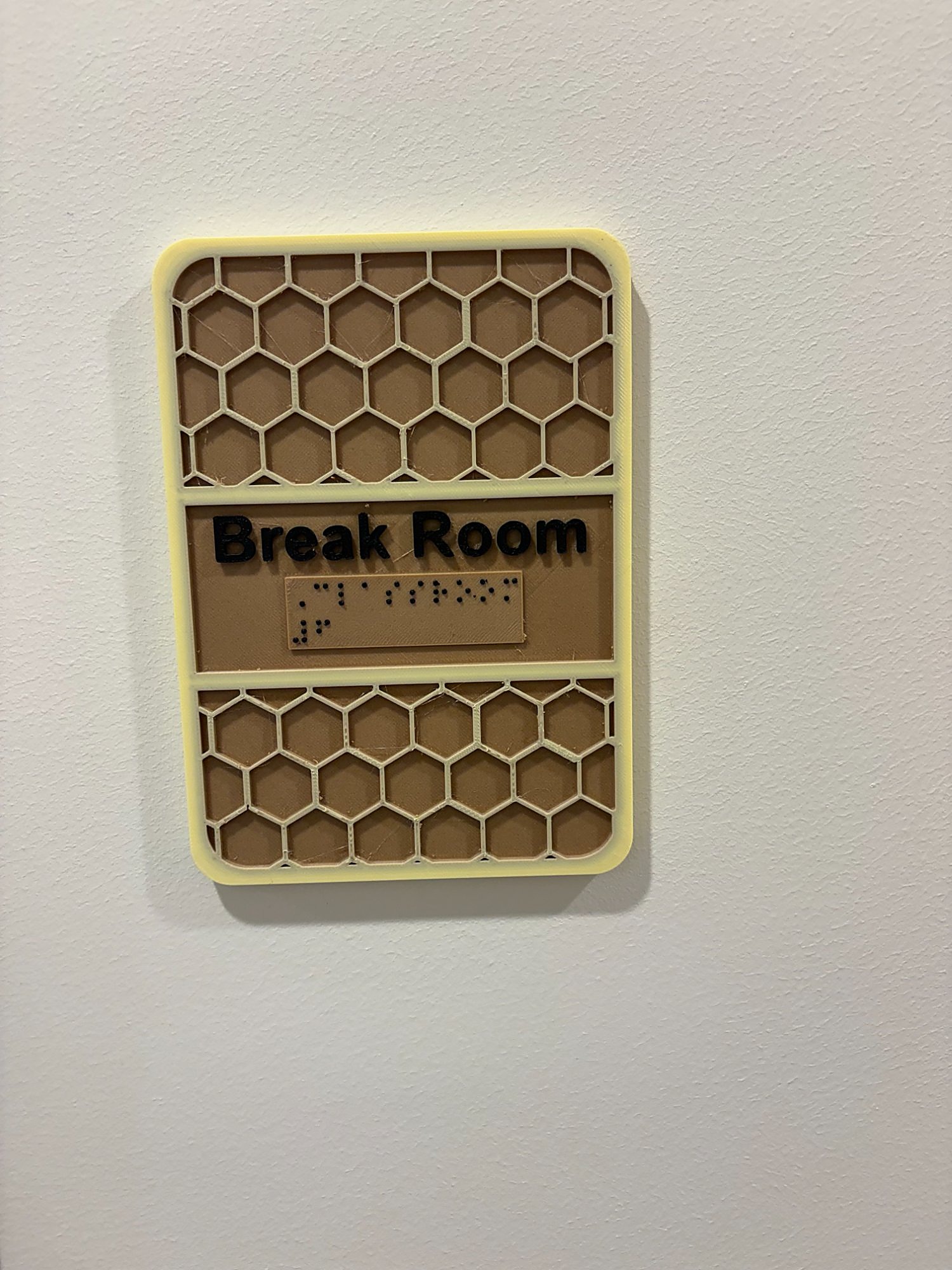 Custom ADA break room sign by CBI Lighting & Manufacturing with tactile lettering and Braille