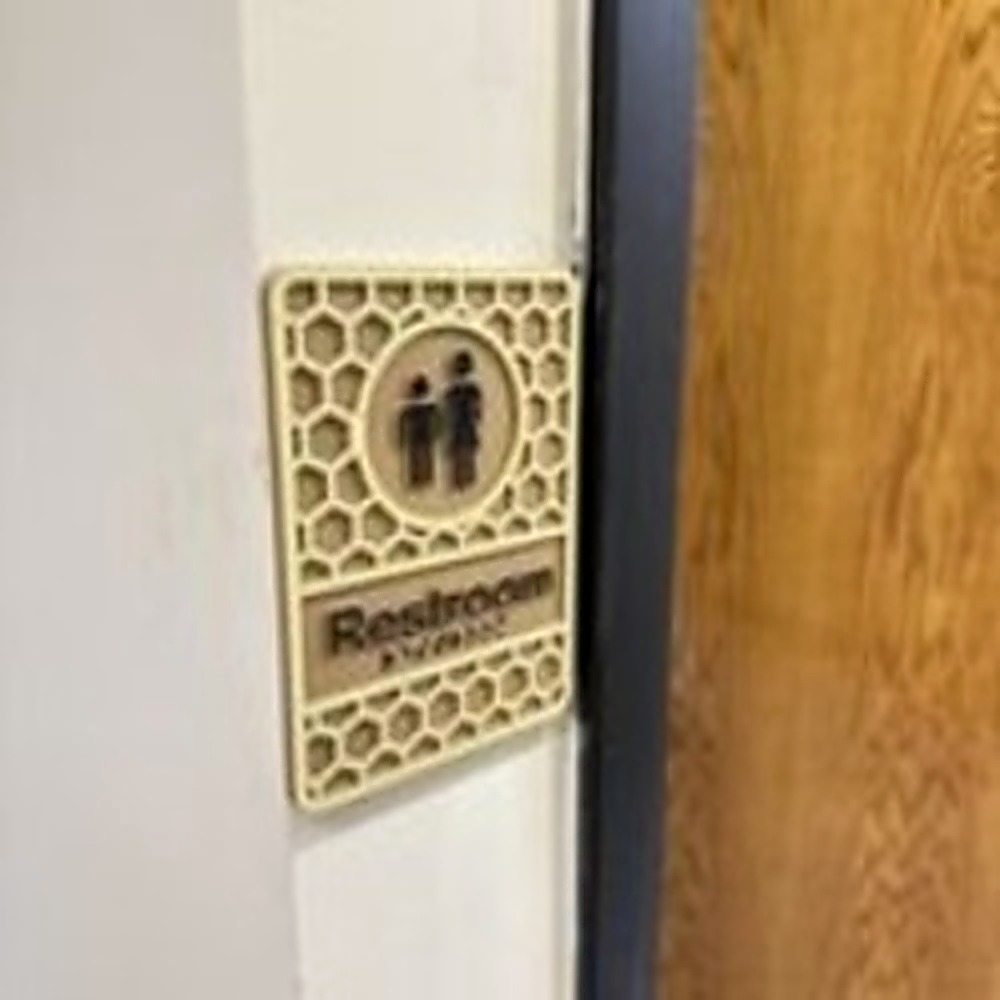 Custom ADA restroom sign with Braille for offices, healthcare facilities, and public buildings